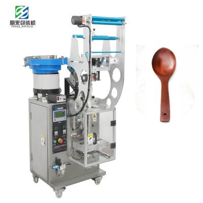 China PLC+English Full Screen Automatic Spoon Plastic Bag Making Spoon Vibration Filling Spoon Count and Vibration Packing Machine for sale