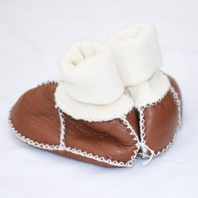 China Newborn Baby Shoes Stylish Massage Sheep Fur Baby Boy Shoes With Soft Sole for sale