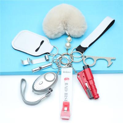 China Metal Key Chain Checked Manufacturer Aluminum And Iron Material Wholesale Key Chain With Fur Ball for sale