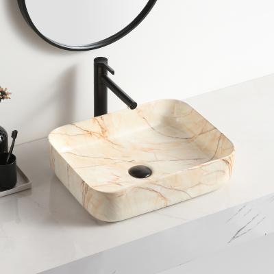 China Easy Clean Orange Ceramic Marble Sanitary Ware Classic Fashion Hotel Wash Basin Countertop Wash Basin Square Bathroom Sink for sale