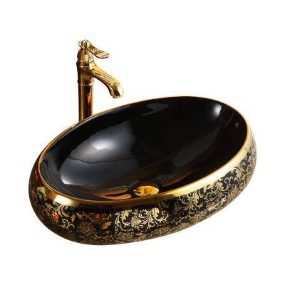 China Easy To Clean Antique Oval Black And Gold Plated Ceramic Sink Banyo Wash Basin Countertop Hand Wash Cabinet Bathroom Sink for sale