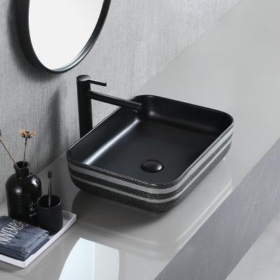 China Hotel Lavavos Art Basins Decorated Easy Clean Elegant Ceramic Matte Lavatory Wash Basin Bathroom Sink Bathroom for sale