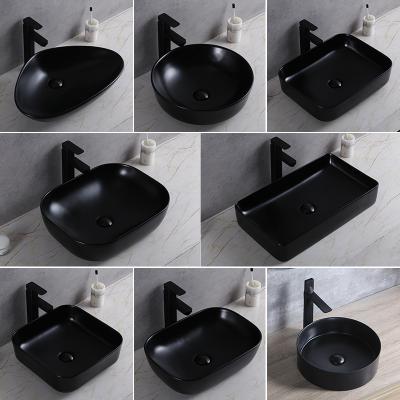 China Hotel Modern Smooth Exterior Seramik Tezgah UstubanyoLlavabo sundries Matte Black Bathroom Vanity Vessel sink countertop Ceramic Art Basin for sale