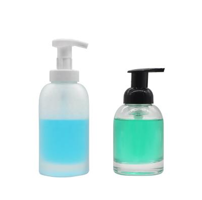 China Personal Care 250ml 375ml Silicone Hand Sanitizer Glass Bottle Dispenser Bottle With Soap Foam Pump for sale