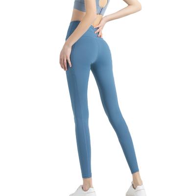 China Breathable High Quality High Waisted Butt Lift Yoga Pants Leggings Women With Phone Pockets for sale