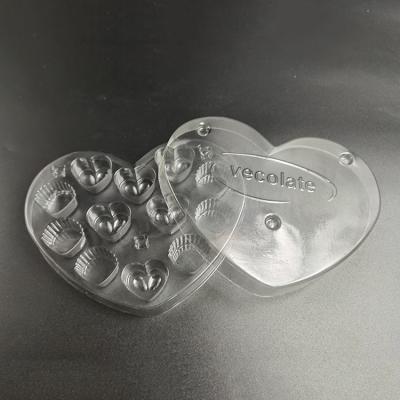 China Disposable Custom food grade plastic heart shaped transparent chocolate dessert waffle trays for sale