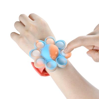 China New Trigger Octopus LED Light Wearable Push Bubble Bracelet Sensory Wristband 25*7.5cm Finger Press Restless Person Toys Silicone Doll Sensory Bracelet for sale