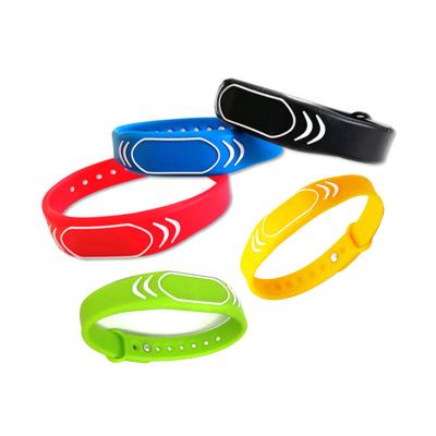 China Factory price 13.56mhz adjustable waterproof/waterproof nfc wristband customized rfid silicone wristband for sports event for sale