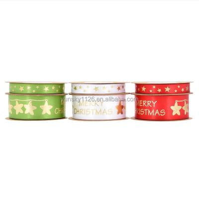 China Hot Sale 100Yards Bell Star Printing Printed Merry Christmas Ribbon Christmas Gift Decoration Christmas Gold Foil Printed For Polyester for sale