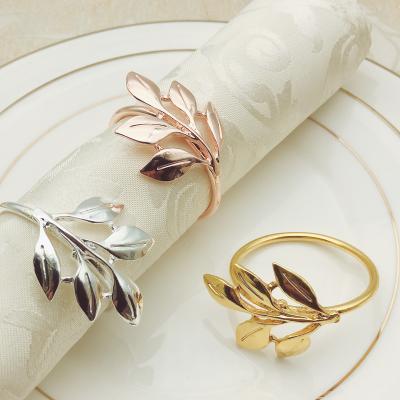 China Wholesale Metal Leaf Hotel Towel Ring Hotel Maple Leaf Stocked Gold Napkin Ring Towel Buckle Wholesale for sale