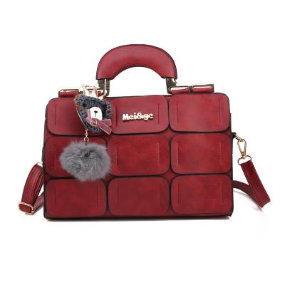 China 2020 fashion women's bag Spring and Autumn New jiugongge patchwork wool bear cross-body cross-body bag for sale