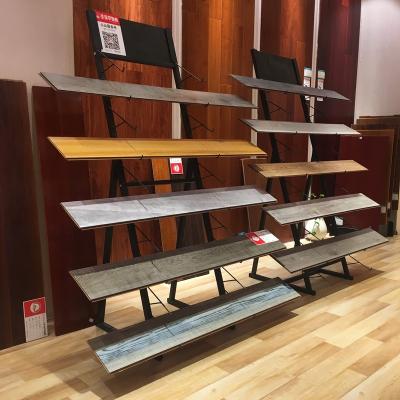 China Steel Revolving Display Rack Display Rack Customized Line Type Floor Wood Display Frame Rack for sale