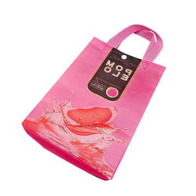 China Reusable Portable Eco-Friendly Belt Button Non-woven Shopping Bag Eco-friendly Customized Bag With Logo for sale