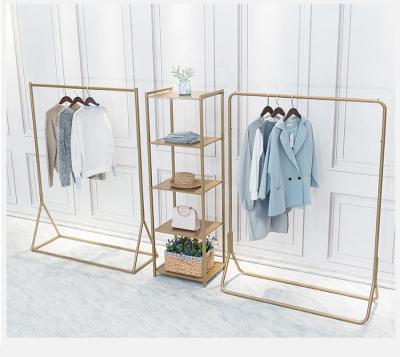 China Minimalist Display Rack for Clothes, Hats, Shoes and Bags Gold Gold Makeup Display Rack for sale