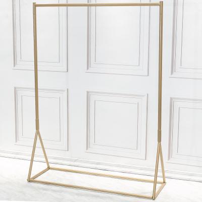 China Fashion show good prices round tube floor display stand cutlery rack right angle for wall display rack table clothing for sale