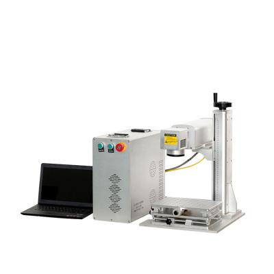 China Portable Automatic Laser Marking CNC 30W Cattle Ear Tag Fiber Laser Writing Machine for sale