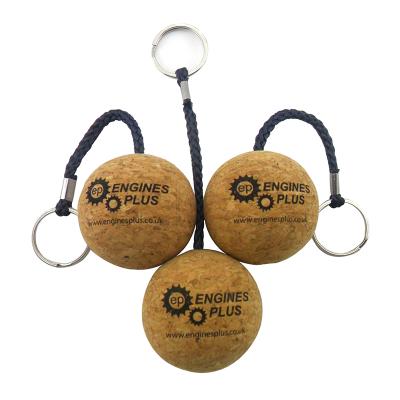 China Promotional High Quality Keychain Floating Zinc Metal Eyelet Cork Key Ball Floating Key Holder With Logo Cork for sale