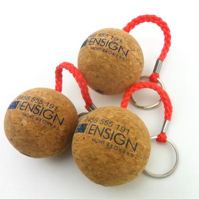 China Custom Promotional Wooden Gift Birthday Gift Business Ball Pendant Floating Wooden Floating Key Chain Floating Key Chain for sale