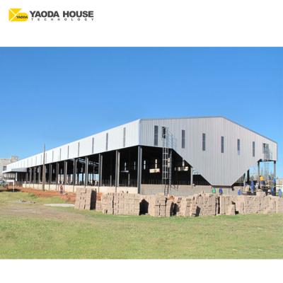 China Modern Zambia Project Prefabricated Steel Structure Metal Roof Prefab House Lightweight Steel Frame Warehouse for sale