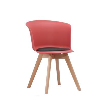 China (Other) Latest Design Adjustable Dining Chair Nordic Style One Plastic Chair With One Cushion Plastic Dining Chairs for sale