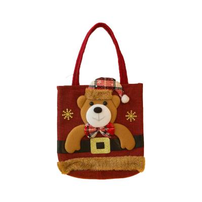 China Lovely Fashion New Christmas Ornament Old Snowman Elk Canvas Doll Tote Bag With Small Foot Gift Christmas Kids Candy Gifts Bag for sale