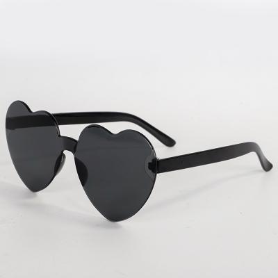 China Fashion Sunglasses Shape Heart Kids Sunglasses Boys Girls Heart Rimless Kids Outdoor Travel UV400 Glass Sun Eyewear for sale