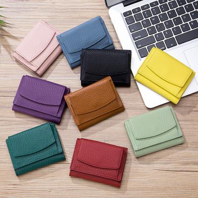 China Lady Ladies Mini Wallet Latest Design RFID blocking lychee pebble lychee clutch genuine leather ladies pinch women triple wallet for sale