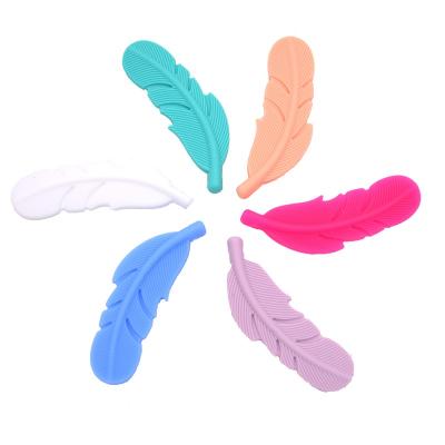 China Wholesale Soft Food Grade BPA Free Soft Baby Chew Teething Baby Toy Feather Shape Teether Silicone Teether for sale