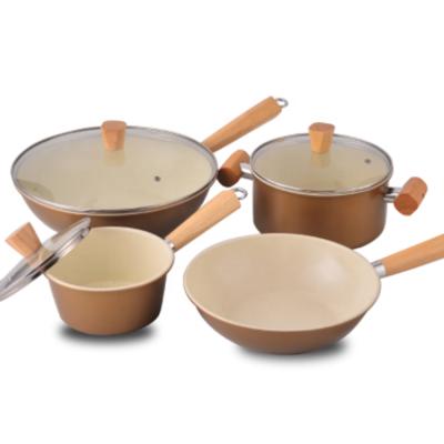 China Durable Carbon Steel Saucepan Custom Non Stick Wooden Handle Non Stick Cookware Sets for sale