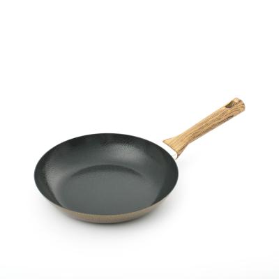 China Carbon Steel Sustainable Professional Cookware Soft Touch Handle Nonstick Coating Wooden Frying Pan for sale