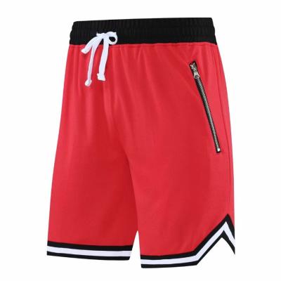 China Breathable Basketball Shorts Zipper Pockets Sports Shorts Sports Apparel Uniforms Customized Logo Number for sale