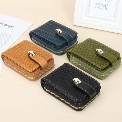 China Fashion Foreign Trade First Layer Oil Wax Business Card Bag Buckle Card Holder Snake Grain Leather Wallet for sale