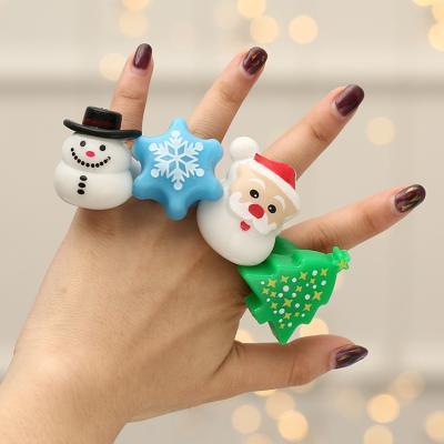 China Amazon Popular Christmas Gift Hot Selling Christmas Party Ornaments Hand Ring Juguetes De Navidad Xmas Finger Light Toys Kids for sale