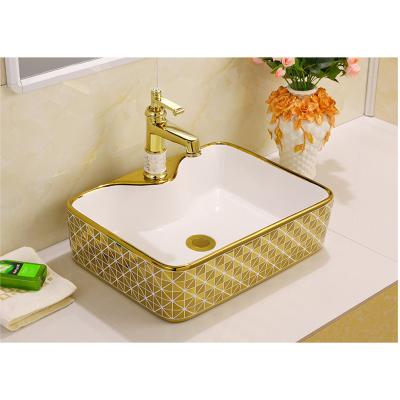 China New Art Decorated Ceramic Small Counter Top Gold Wash Basin Modern Luxury Bathroom Sink Gold Wash Basin for sale