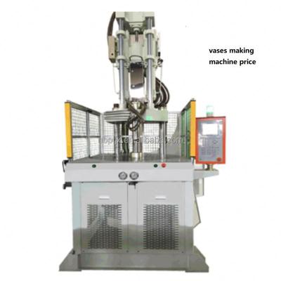 China VERTICAL Vertical Injection Molding Machine Vases Making Machine for sale