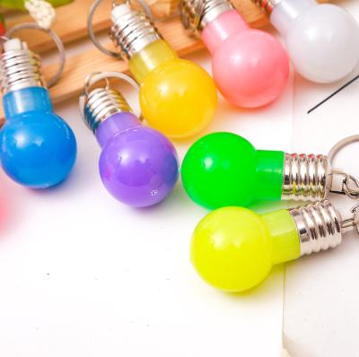 China Colorful Plastic 6 Colors LED Light Bulb Key Chain Mini Size Light Blub Keychain For Kids for sale