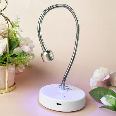 China Soft Gel Tips Curing Portable Wireless Flash Cure Led Rechargeable 2022 Nail Lamp for sale