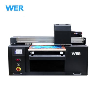 China Garment shops A2 WER E4880UV printing directly on phone cases, pens, lighters, PVC cards, UV led flatbed printer for sale