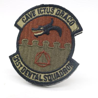 China Handmade custom high quality merrow border embroidered patches, embroidered patches on a vulture pattern for sale