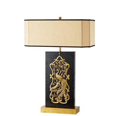 China Modern popular decorate table lamp hotel home living room retro peacock cut out table lamp with competitive price for sale