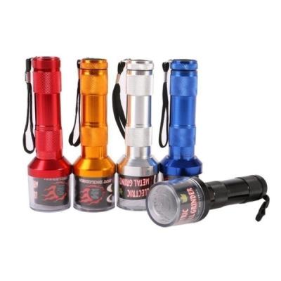 China New Design Tobacco Smoke Accessory Red Plastic Flashlight Electric Herb Grinder Grinder for sale