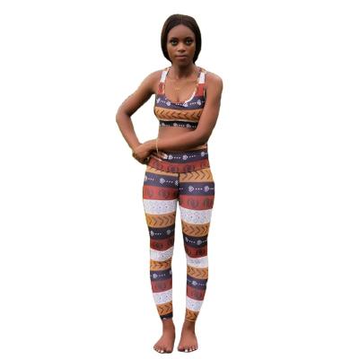 China Custom Stylish Fitness Quick Dry Bra Yoga Gym Polyester Logo African Yoga Runner Vest for sale