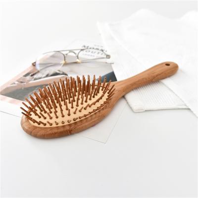 China Waterproof Eco Friendly Organic SkinScalp Massage Cushion Natural Material Bamboo Premium Crafted Detangling Hair Brushes for sale