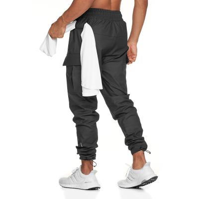 China 2021 High Quality New Fashion Breathable Casual Cargo Pants Men Loose Fit Trousers for sale