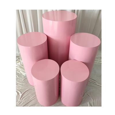 China New Modern Pink Metal Pedestal Stand Round Cylinder Cake Table For Baby Shower for sale