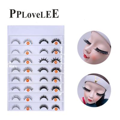 China Light factory wholesale faux mink deeply curled 14 mm length synthetic eyelash custom label box for sale