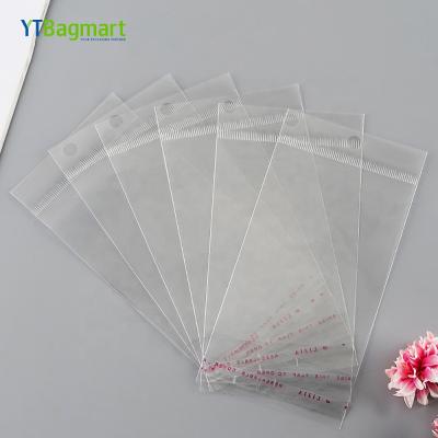 China Moisture Proof Self Adhesive Clear Self Adhesive Opp Seal Bag Food Packaging YTBagmart Bopp Header Plastic Bag for sale