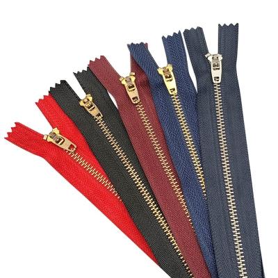 China Spring Lock Fashion Decorative 6 Inch End Metal Gold Narrow Zipper For Jeans Wholesale for sale