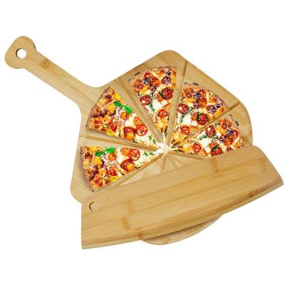 China Sustainable Pizza Skin Set Perforated Wooden Bamboo Pizza Cutting Board Pizza Skin With Long Cutter Handle for sale