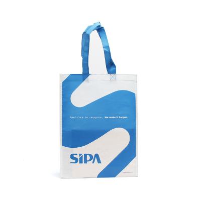 China Customized Logo Reusable Recycled Bottle Material RPET Packaging Promotional Shopping Bag With Lamination for sale